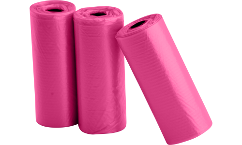 Drei Rollen mit je 15 rosa Hundekotbeuteln, robust und auslaufsicher, ideal für saubere Entsorgung bei Spaziergängen.
